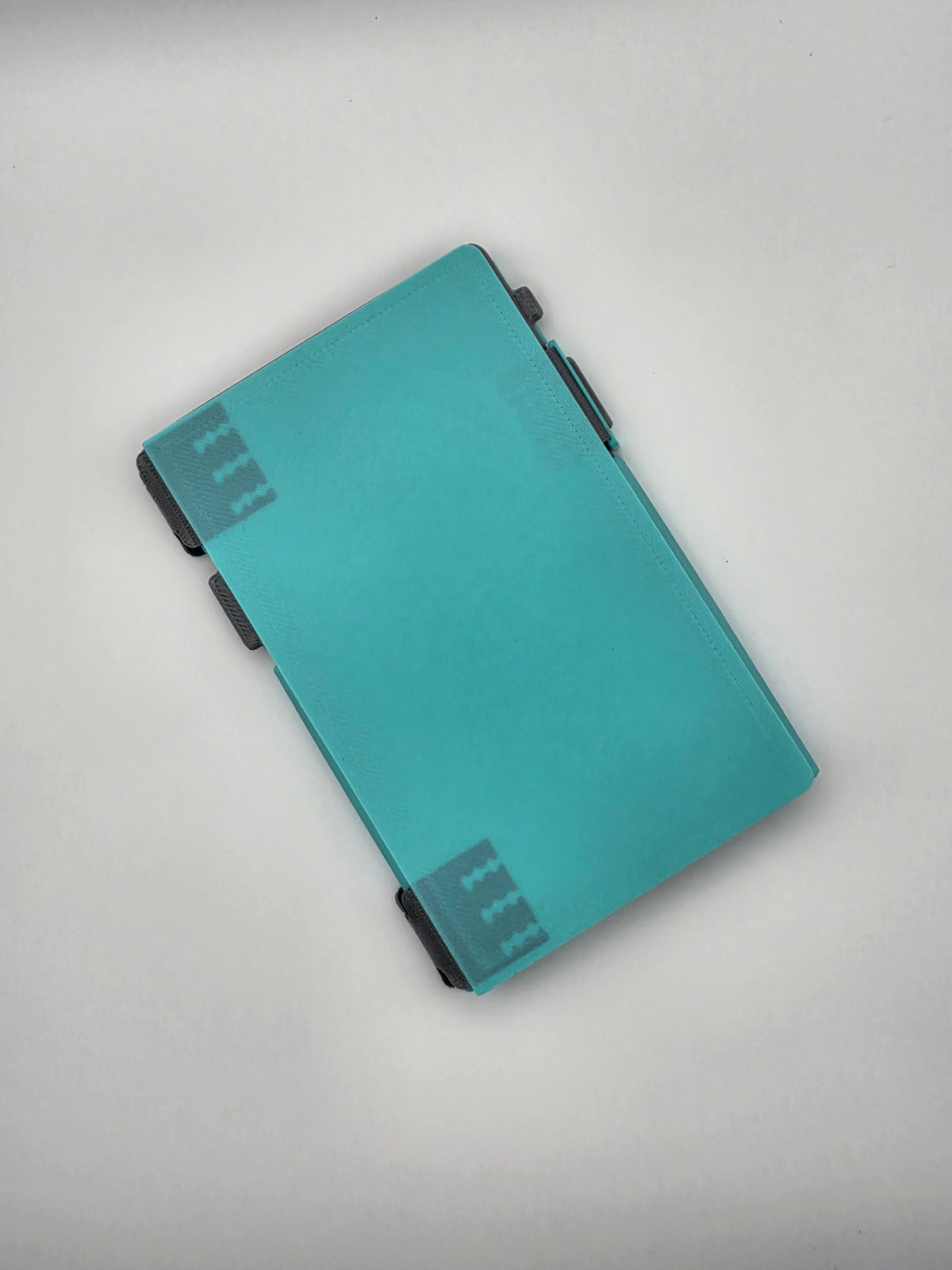 A folio case closed, shown from an overhead angle on a light gray background.