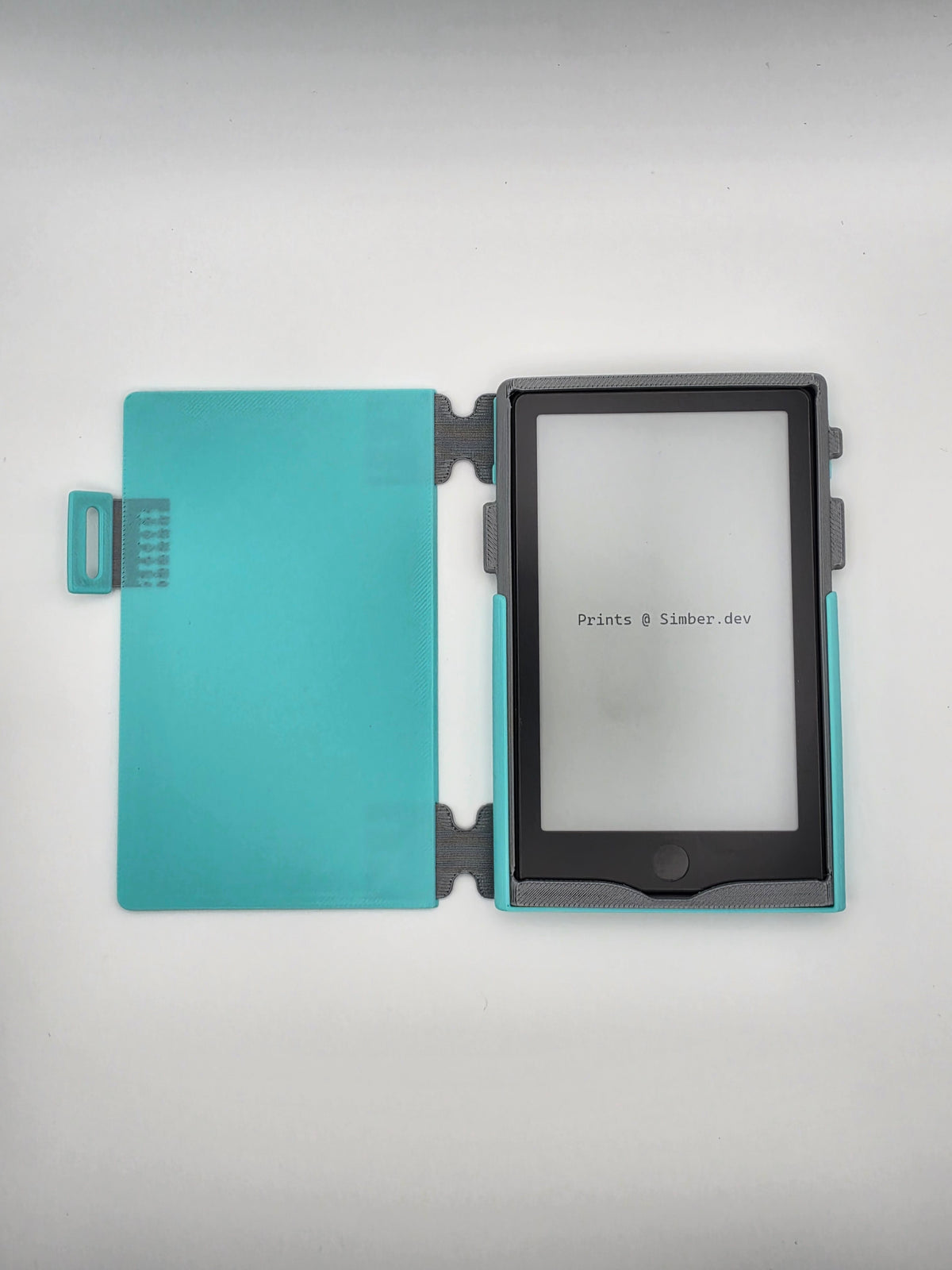 A light blue and dark gray protective case for an e-reader, shown open to display both the inner cover and the screen protector frame on a light gray background.